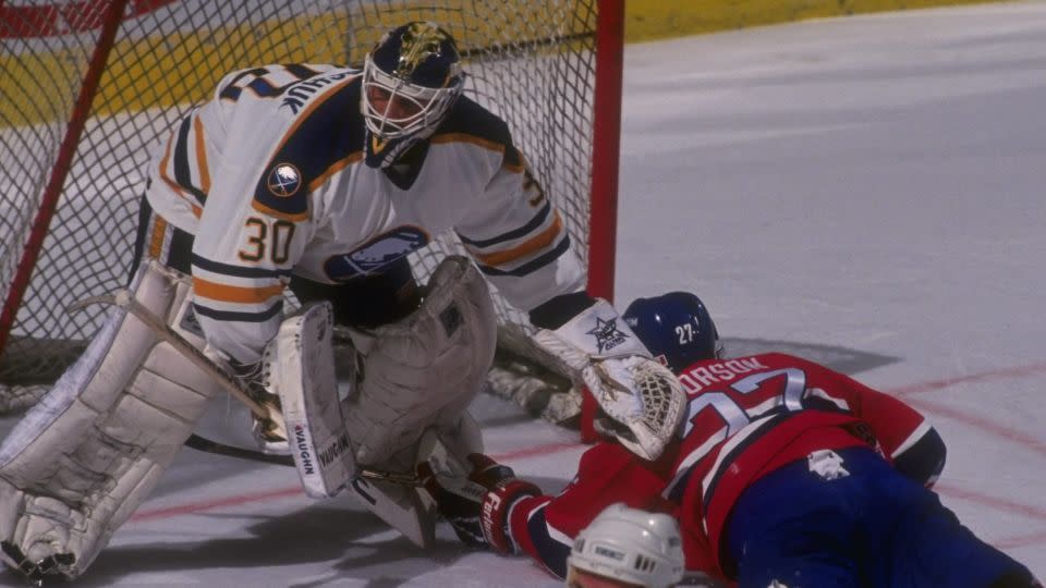 Malarchuk (in goal) stars for the Buffalo Sabres against the Montreal Canadiens at Memorial Auditorium in Buffalo in the 1990/91 season. - Rick Stewart/Getty Images