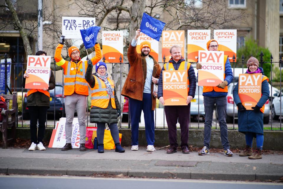 Junior doctors and members of the British Medical Association (BMA) on the picket line outside Cheltenham General Hospital during their dispute over pay (Ben Birchall/PA) (PA Archive)