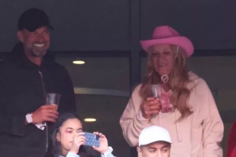 Jurgen Klopp took his wife, Ulla, who was dressed for the occasion when seeing Taylor.