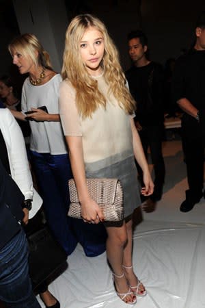 Attending her very first fashion week season, Chloë sat front row at Calvin Klein and wore a sheer, two-tone frock. <em>Dress, Calvin Klein.</em>