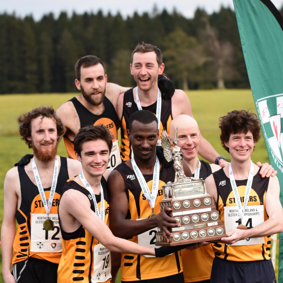 Eskander with his running team (Paul Lawther/PA Real Life)