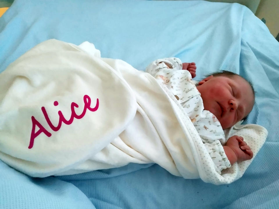 Baby Alice was delivered by her dad, after he'd also helped deliver her older brother, Elliot. (SWNS)