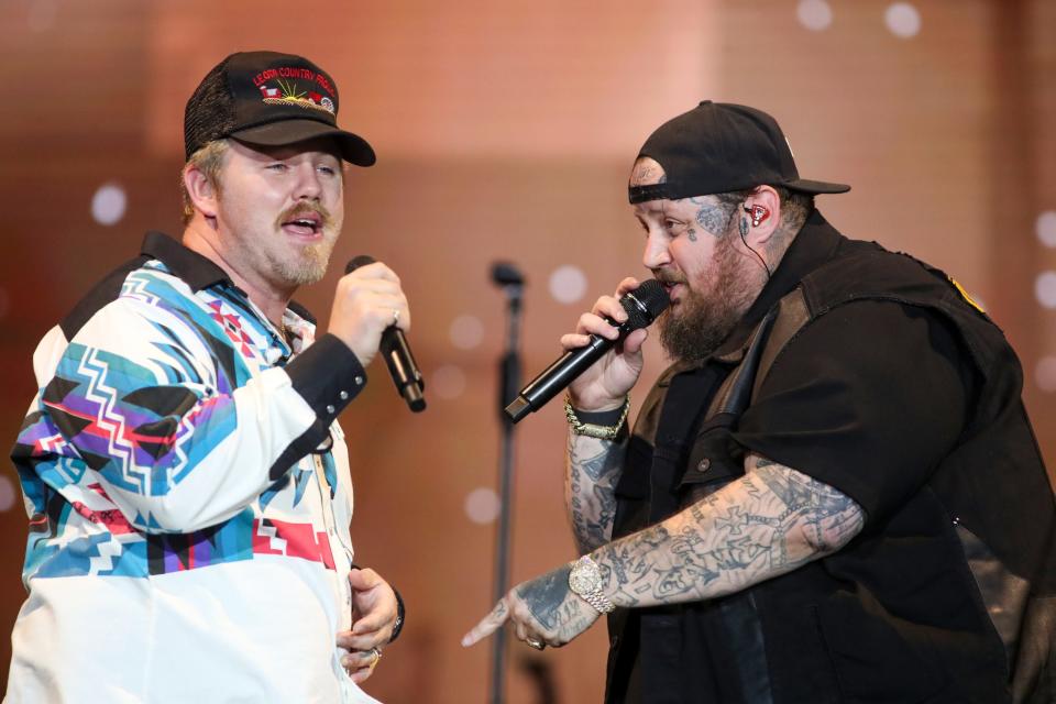 Ernest, left, joins Jelly Roll on the Mane Stage during Stagecoach in Indio, Calif., on Friday, April 26, 2024.