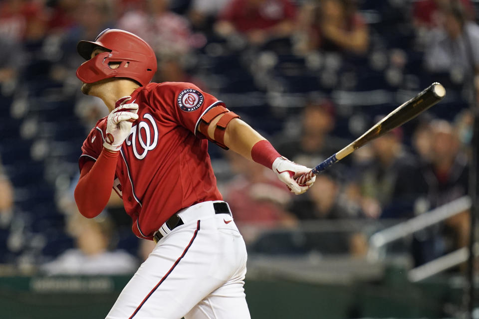 Washington Nationals' Joey Meneses hits a three-run home run in the 10th inning of a baseball game against the Oakland Athletics, Thursday, Sept. 1, 2022, in Washington. Washington won 7-5. (AP Photo/Patrick Semansky)