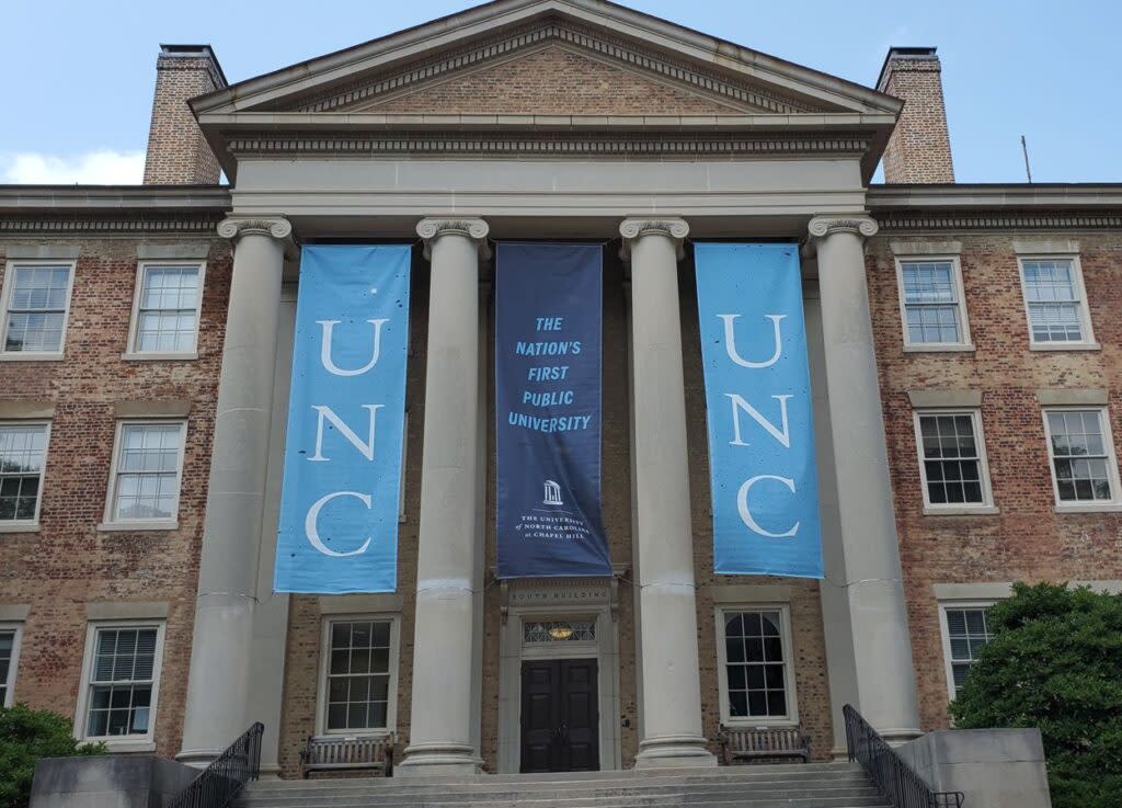 banners saying "UNC" on a building at UNC Chapel Hill