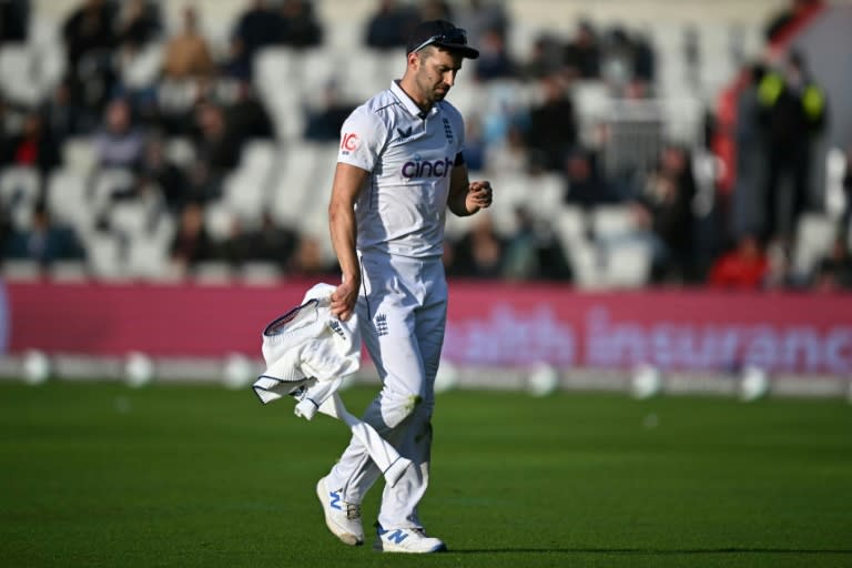 Out: England's fast bowler Mark Wood leaves the field after sustaining a thigh injury in the first Test against Sri Lanka at Old Trafford (Paul ELLIS)