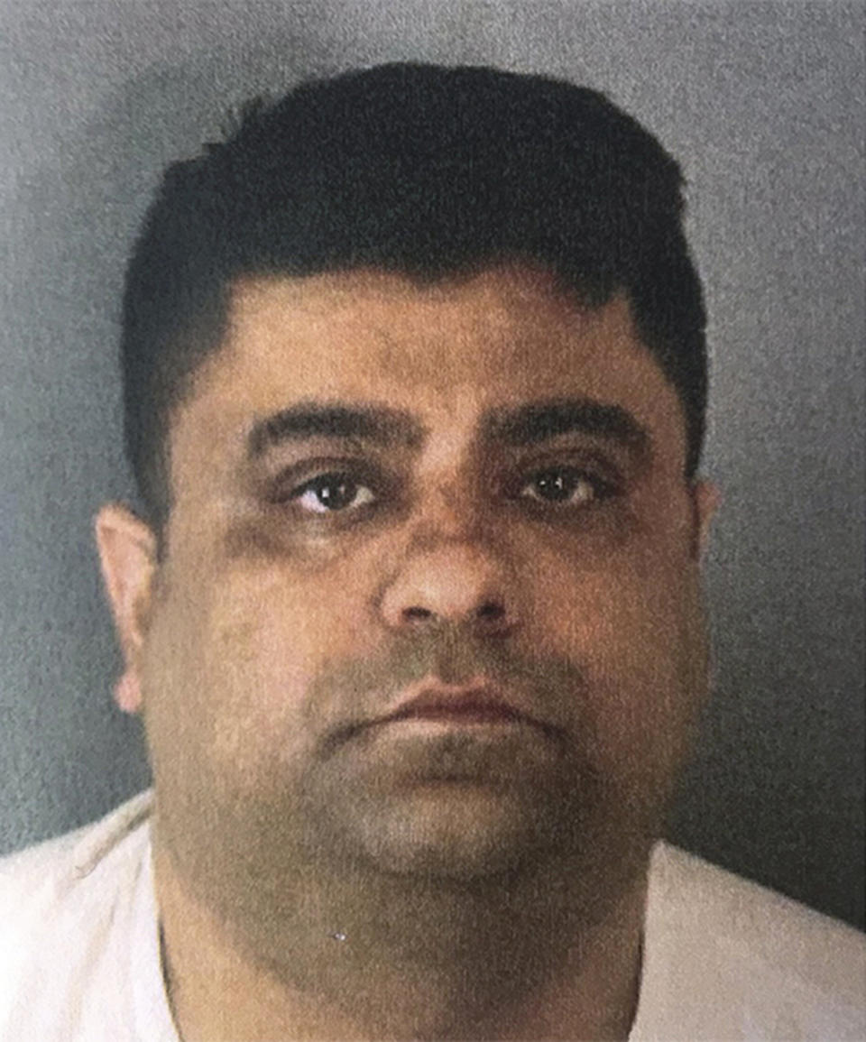 This Monday, Jan. 20, 2020, booking photo released by the Riverside County Sheriff's Department shows Anurag Chandra, 42 of Corona, Calif. Chandra intentionally rammed a Toyota Prius with six teenage boys inside on Sunday in Temescal Valley in Riverside County, southeast of Los Angeles, killing three and injuring three others before fleeing, authorities said Monday. (Riverside County Sheriff's Department via AP)