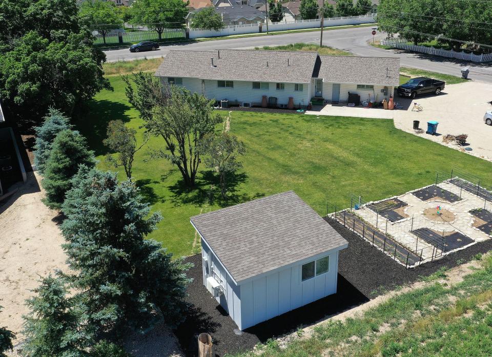 A backyard shed in Pleasant Grove on Wednesday, June 21, 2023. A Utah company builds them using residential construction methods and materials and are under 200 square feet qualifying them as “sheds,” helping avoid licenses. | Jeffrey D. Allred, Deseret News