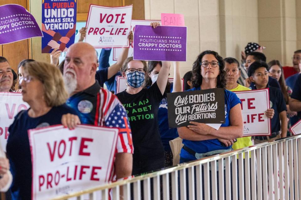 Constituents both supporting and protesting a vote to overturn Gov. Roy Cooper’s veto of an abortion restriction bill demonstrate Tuesday, May 16, 2023, at the Legislative Building in Raleigh, N.C.