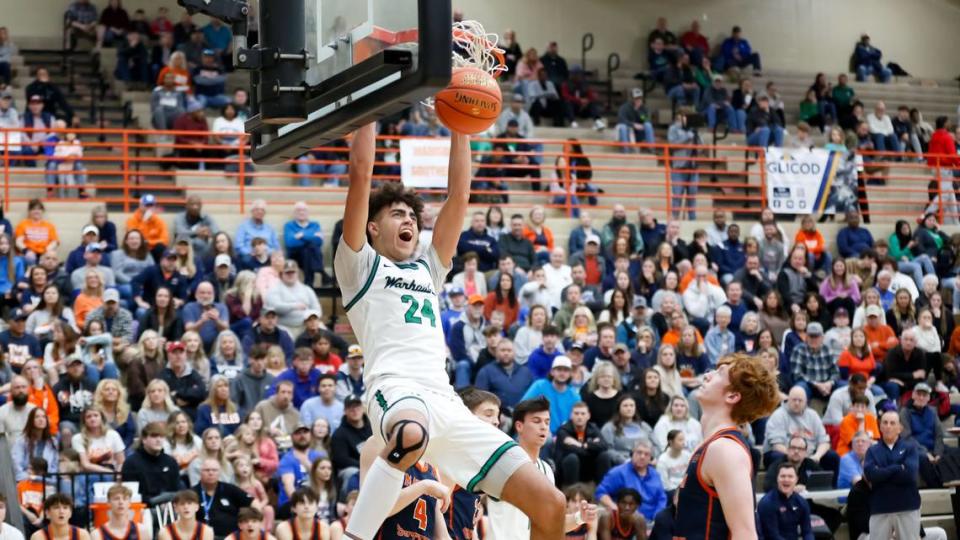 Great Crossing’s Malachi Moreno dunks against Madison Southern during the boys 11th Region Tournament semifinals at Paul Laurence Dunbar High School on Saturday.