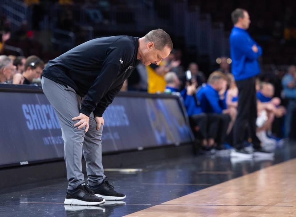 Wichita State coach Paul Mills hangs his head in the final minutes of his team’s loss to South Dakota State on Saturday. 