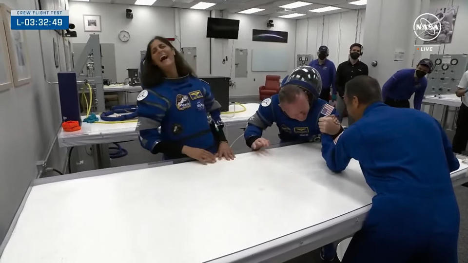 NASA chief astronaut Joe Acaba, right, and Starliner commander Barry 