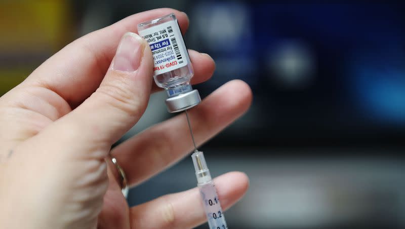 A COVID-19 vaccine is drawn at Salt Lake County Health Center in Salt Lake City on Wednesday, Oct. 4, 2023. The World Health Organization warns that a coronavirus subvariant, JN.1, could cause a surge in cases. 