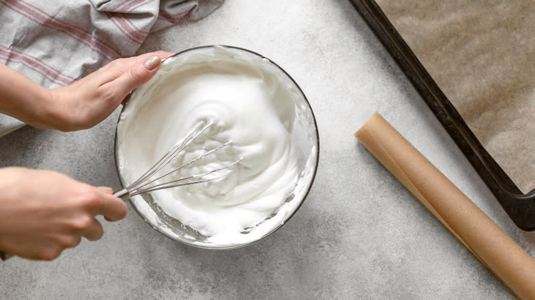 Baker making whipped cream