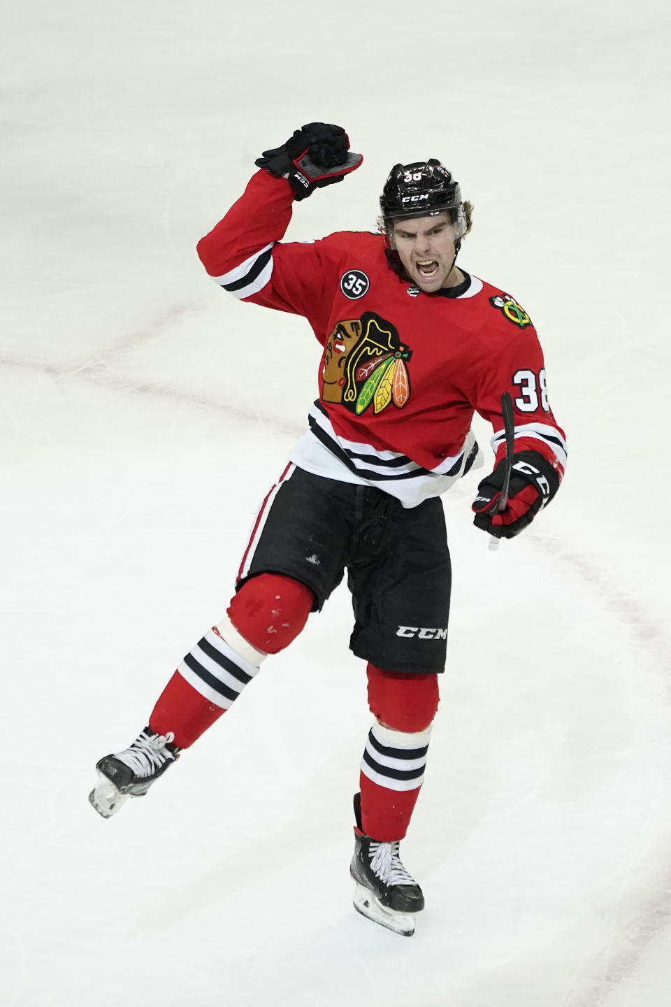 Chicago Blackhawks' Brandon Hagel celebrates his goal during the first period of an NHL hockey game against the Ottawa Senators Monday, Nov. 1, 2021, in Chicago. (AP Photo/Charles Rex Arbogast)
