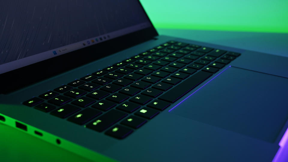Razer Blade 14 Mercury Edition backlit keyboard and touchpad close up
