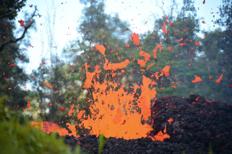 Lava&nbsp;spews from a fissure in Leilani Estates on Friday.