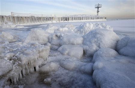 A beachfront is covered in ice in Chicago, Illinois, January 8, 2014. REUTERS/Jim Young