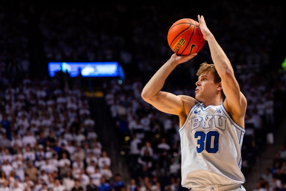 Brigham Young Cougars guard Dallin Hall (30) shoots a 3-point basket during a men’s college basketball game between Brigham Young University and Baylor University at the Marriott Center in Provo on Tuesday, Feb. 20, 2024. | Megan Nielsen, Deseret News