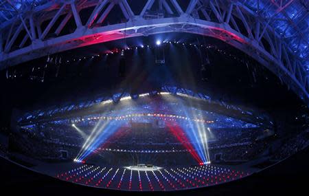 The opening ceremony of the 2014 Sochi Winter Olympics begins with the colours of the Russian flag being projected over Fisht Stadium February 7, 2014. REUTERS/Lucy Nicholson