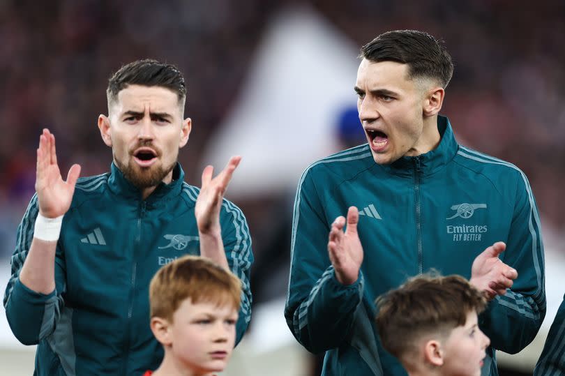 Jorginho of Arsenal and Jakub Kiwior of Arsenal cheer as the UCL theme finishes during the UEFA Champions League quarter-final first leg match between Arsenal FC and FC Bayern M¸nchen at Emirates Stadium on April 9, 2024 in London, England.