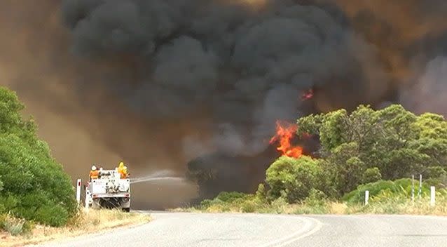 Firefighters battle the blaze on Eyre Peninsula near Point Boston. Picture: Ron Campbell.