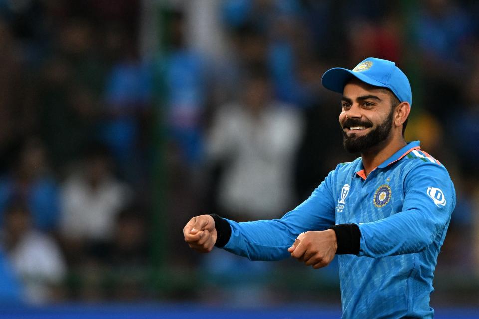 Kohli celebrates as the wickets started to fall (AFP via Getty Images)