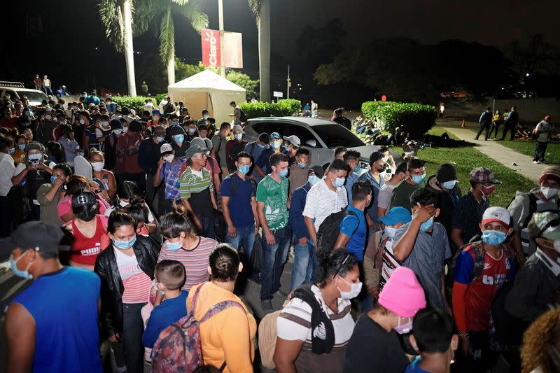 Hondurans take part in a new caravan of migrants, set to head to the United States, in San Pedro Sula