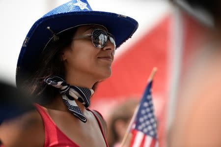 Jul 23, 2016; Los Angeles, CA, USA; Natalie Garnica watches the Team USA Road to Rio tour announcement show at Venice Beach. Mandatory Credit: Kelvin Kuo-USA TODAY Sports