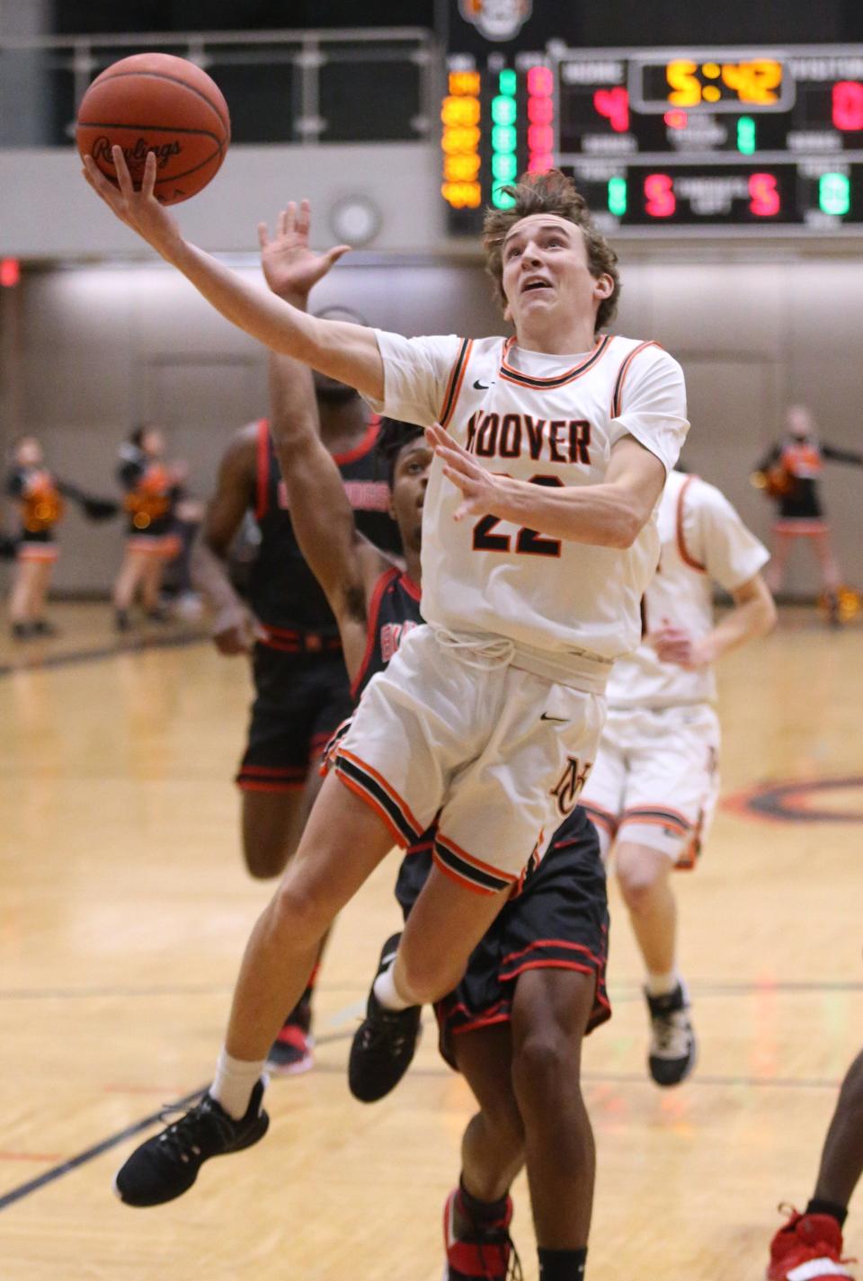 Wes Collins of Hoover flies through the lane on the way to the basket during their game against McKinley at Hoover on Friday, Feb. 12, 2021. 