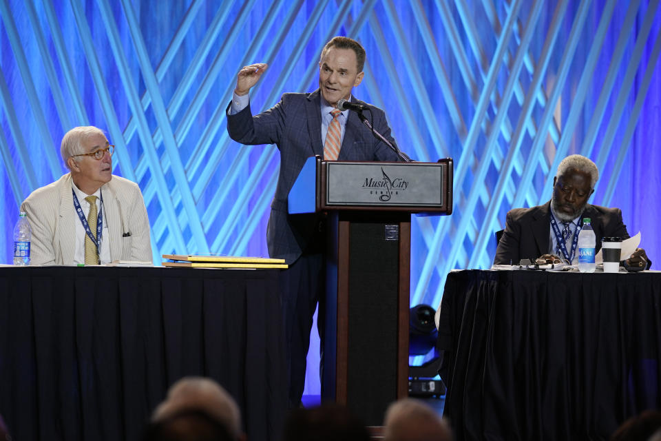 Dr. Ronnie Floyd, center, president and CEO of the executive committee of the Southern Baptist Convention, speaks during the executive committee plenary meeting at the denomination's annual meeting Monday, June 14, 2021, in Nashville, Tenn. (AP Photo/Mark Humphrey)