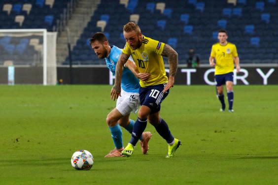 Johnny Russell in action for Scotland (AFP via Getty Images)