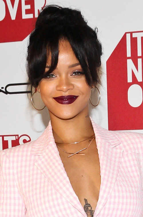 At an event sponsored by the MAC Cosmetics AIDS Fund, Rihanna paired a feminine skirt suit with plummy lips and a side-swept fringe.