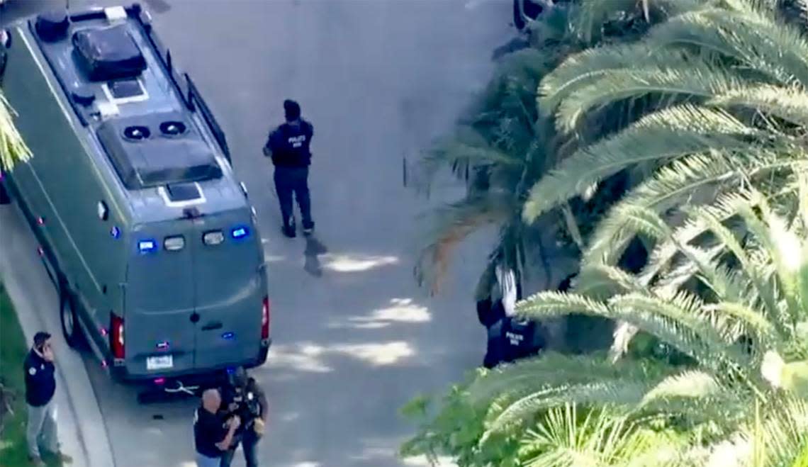 Federal agents outside the Star Island properties of Sean “Diddy” Combs.