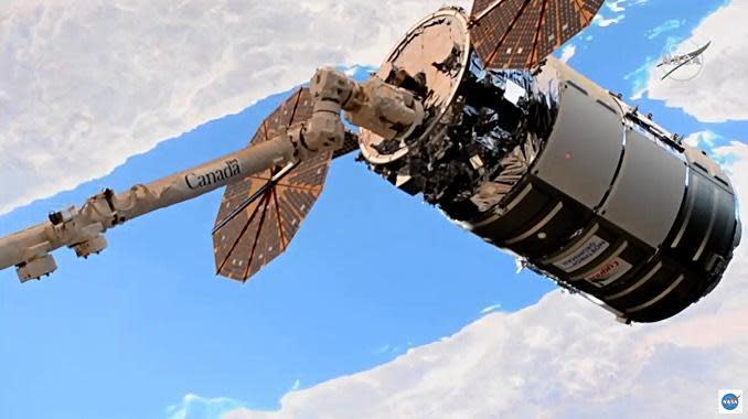 Northrop Grumman's Cygnus cargo ship was captured by the International Space Station's robot arm early Monday as the two spacecraft sailed high above the Middle East. / Credit: NASA TV