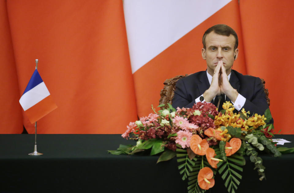 French President Emmanuel Macron attends a joint news conference with China's President Xi Jinping at the Great Hall of the People in Beijing, Wednesday, Nov. 6, 2019. (Jason Lee/Pool Photo via AP)