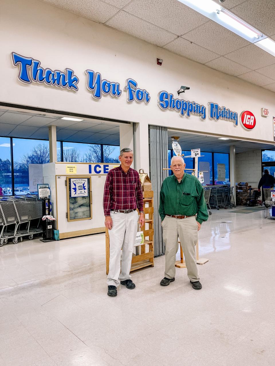 Dale, left, and Joe Longmire have worked together for 45 years, first at their parents’ grocery store and since 1997 in their Midway IGA store in the Gibbs Center. “We must have enjoyed all of it or we wouldn’t have done it so long, but then again we don’t know any different,” said Dale. Joe admitted that they each have their own aisles they like to do.