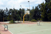 A basketball court is pictured in a former Peloponnese tourist resort that has been turned into a migrant home near the town of Myrsini, southwest of Athens, Greece, August 13, 2016. Picture taken August 13, 2016. REUTERS/Michele Kambas