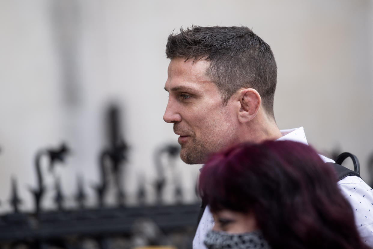 Former cage fighter Alex Reid arrives at the Royal Courts of Justice, London, where he has been jailed for eight weeks for contempt of court after he lied in a witness statement for a compensation claim following a car crash. Picture date: Wednesday April 21, 2021.