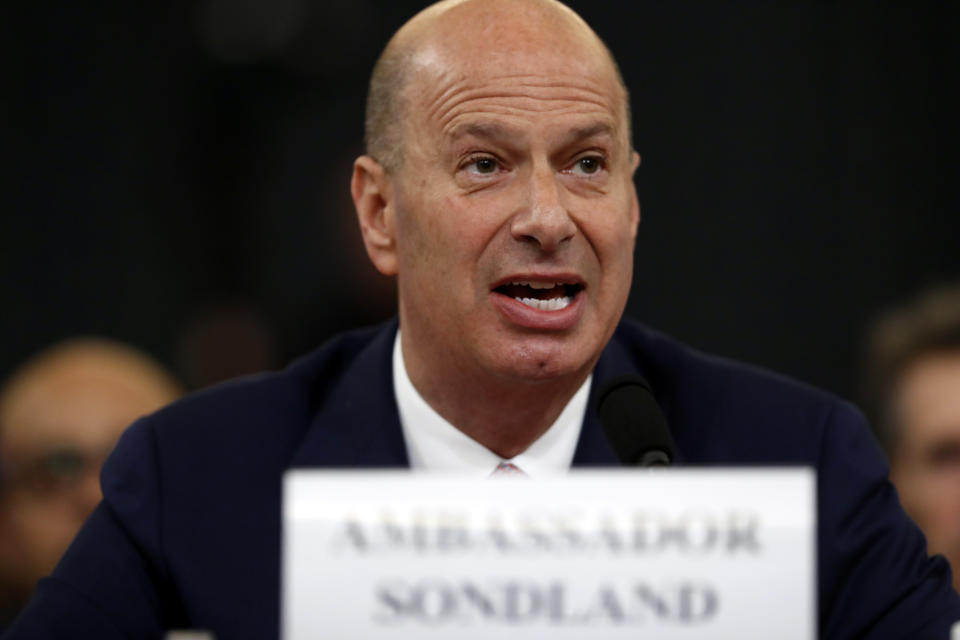 U.S. Ambassador to the European Union Gordon Sondland gives his opening statement as he testifies before the House Intelligence Committee on Capitol Hill in Washington, Wednesday, Nov. 20, 2019, during a public impeachment hearing of President Donald Trump's efforts to tie U.S. aid for Ukraine to investigations of his political opponents. (AP Photo/Andrew Harnik)