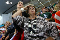 LONDON, ENGLAND - AUGUST 02: Debbie Phelps (R) the mother of Michael Phelps of the United States and his sisterHilary Phelps (L) cheer him on as he competes in gold the Men's 200m Individual Medley final on Day 6 of the London 2012 Olympic Games at the Aquatics Centre on August 2, 2012 in London, England. (Photo by Al Bello/Getty Images)