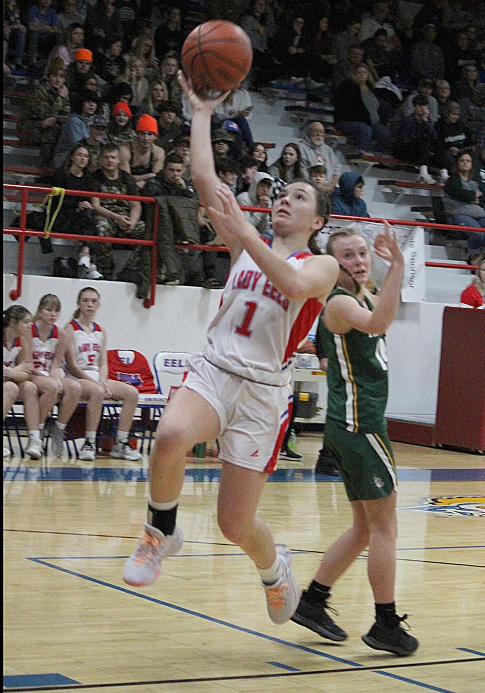 Eminence sophomore Bella Dittemore hits a layup during Wednesday's Powder Keg game against Monrovia.