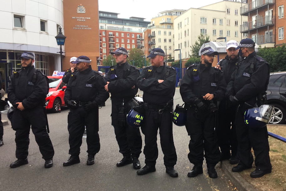 Police have formed a human barrier outside the station: Mirren Gida/Twitter