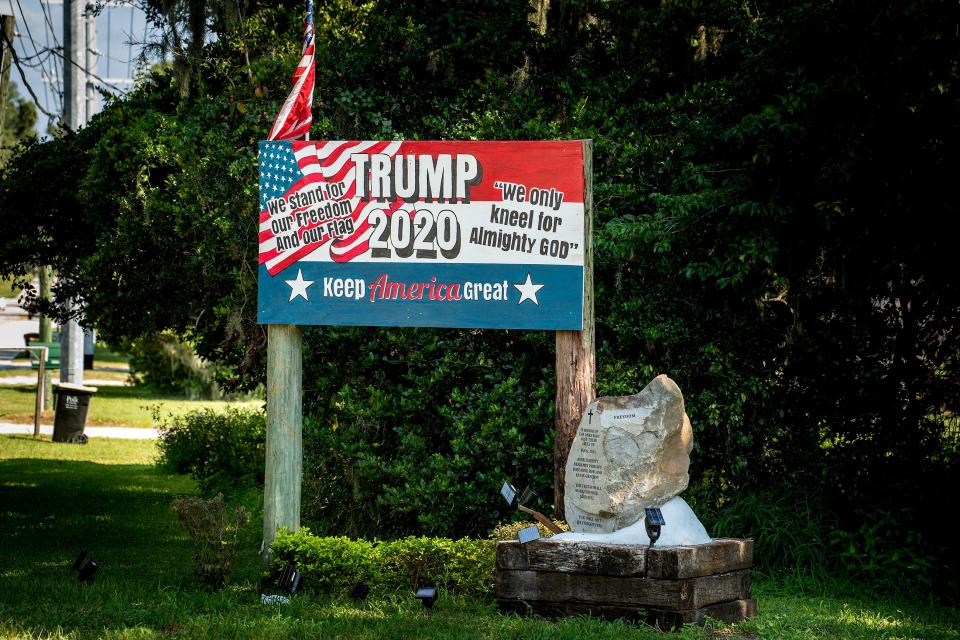 A monument has been installed on the property of the Pollock family in the Kathleen area beside a sign promoting the candidacy of former President Donald Trump.