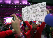 <p>A participant holds a sign during the closing ceremony at the 2016 Rio Olympics on August 21, 2016. (REUTERS/Stefan Wermuth) </p>