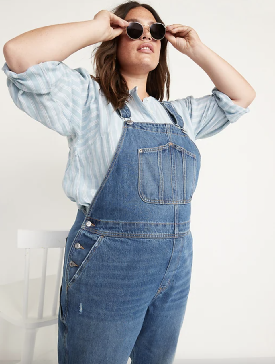 plus size model in blue shirt and Slouchy Straight Jean Overalls 