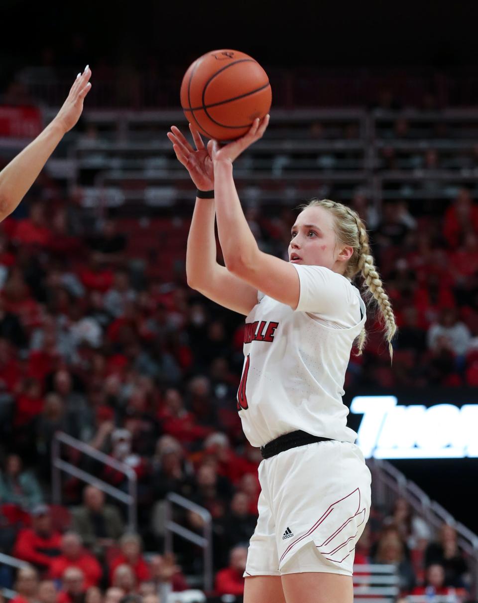 U of L’s Hailey Van Lith (10) shoots against Ohio State during their game at the Yum Center in Louisville, Ky. on Nov. 30, 2022.  