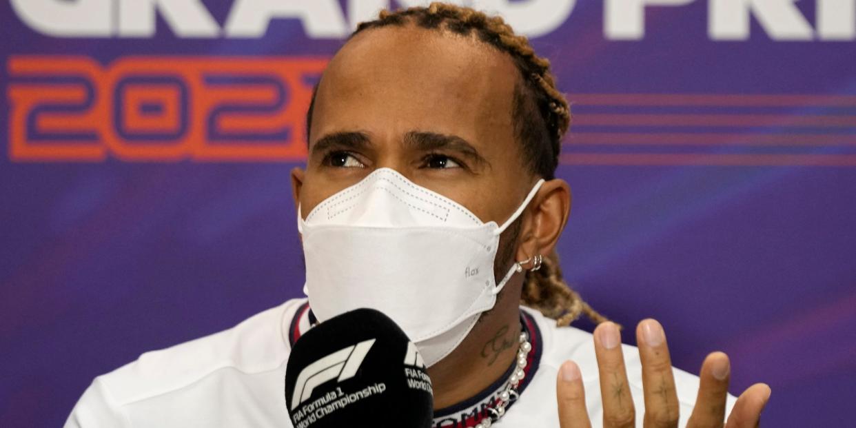 Lewis Hamilton reacts during a press conference ahead of the 2022 Bahrain Grand Prix.