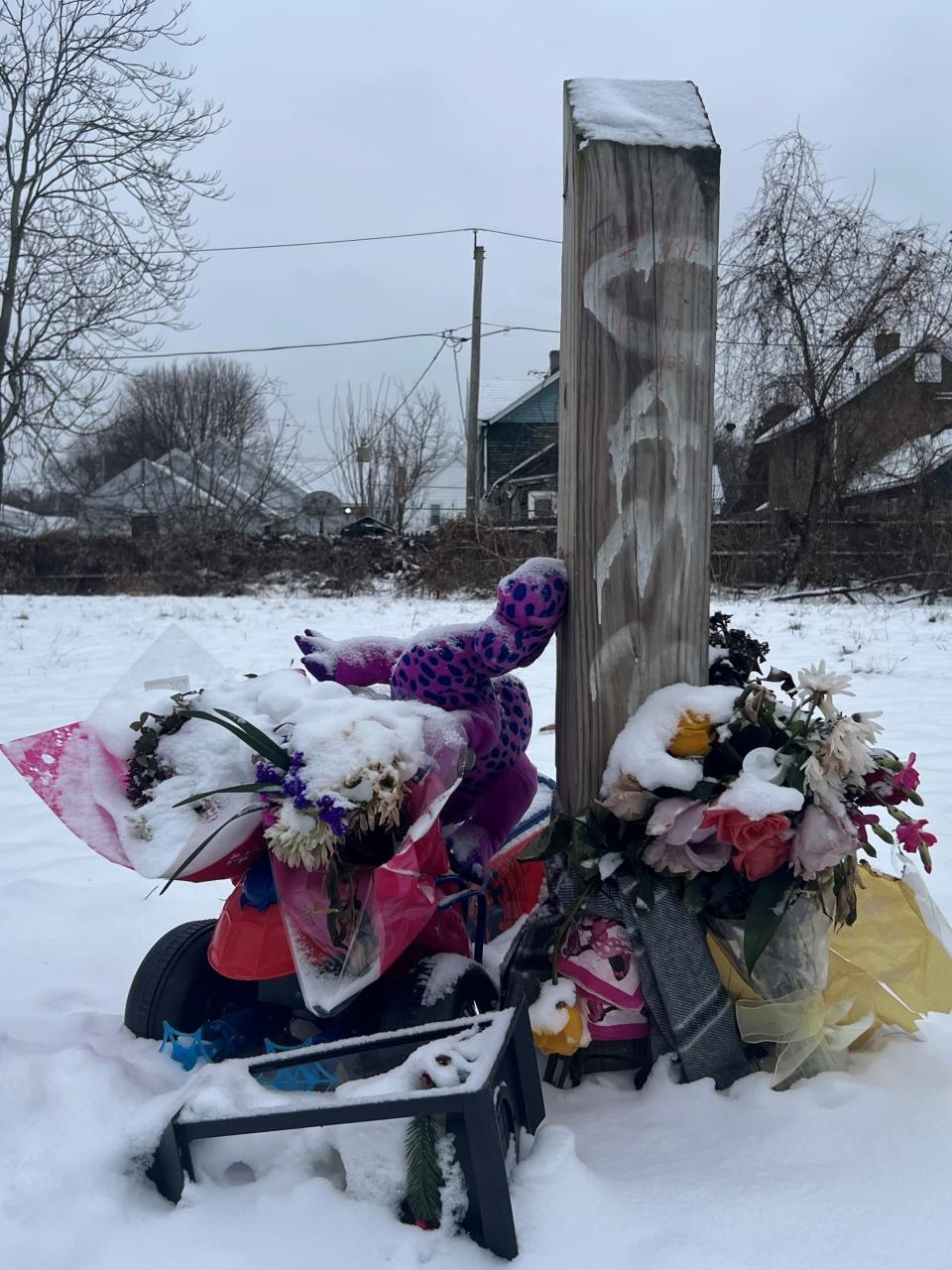 A wooden beam near the spot where Todd Novick was shot and killed by police has become a gravestone of sorts. Someone carved his name into the post with a thin red pen. "RIP my love," the message reads.