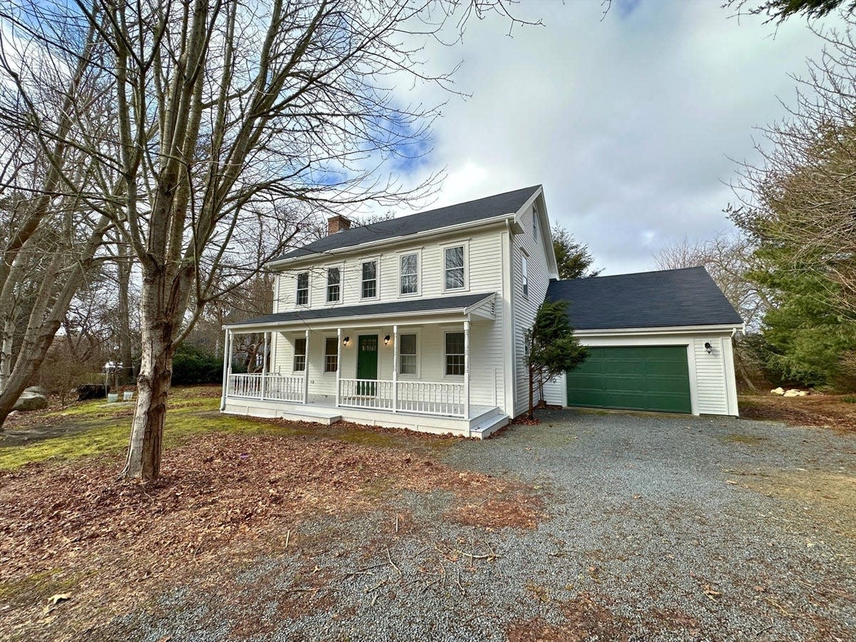 This lovely Brewster home has been completely updated and features three bedrooms and a farmers porch.